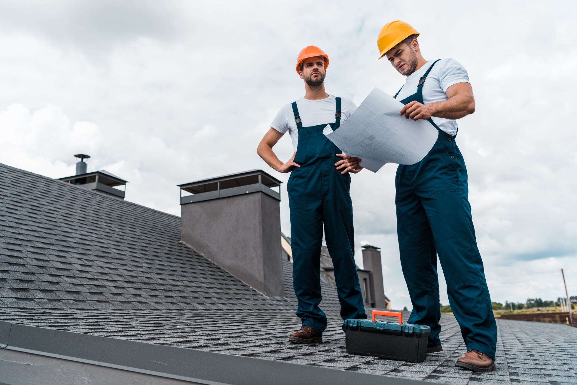 architect-standing-on-roof-with-hands-on-hips-near-M9UHKBM.jpg